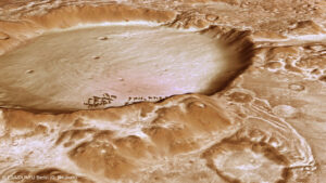 Zasněžený kráter v Charitum Montes