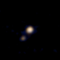 První barevná fotka Pluta ze sondy New Horizons - vyfoceno 9. dubna, vzdálenost 115 milionů kilometrů