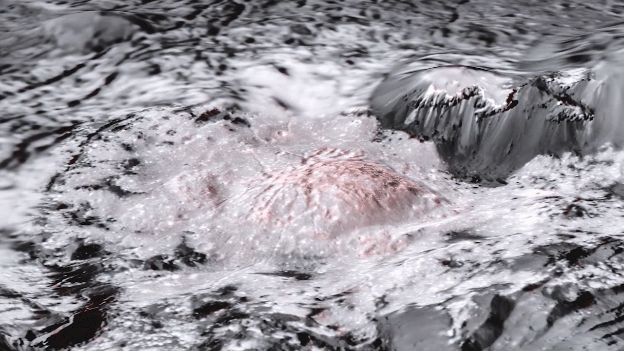 Animace vytvořená ze snímků kráteru Occator v nepravých barvách.