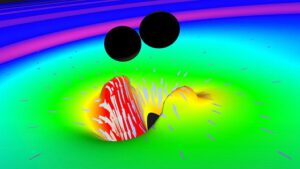 Simulace srážky dvou černých děr. Tento snímek zachycuje obě černé díry již téměř v okamžiku splynutí.