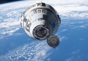 Loď Starliner při svém prvním nepilotovaném příletu k ISS