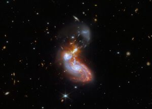 Srážející se galaxie ZW 96 II zachycené Webbovým dalekohledem.