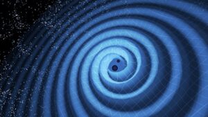 Znázornění přibližujících se černých děr těsně před srážkou a to včetně gravitačních vln.