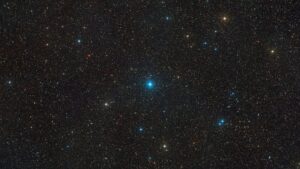Uprostřed snímku hvězda A0620-00. Ta má u sebe souputníka, což je hvězdná černá díra.