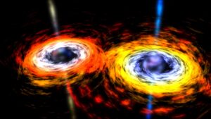 Simulace dvojice supermasivních černých děr. Zde už hodně přiblížených. 