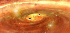 Umělecká představa dvojice supermasivních černých děr obíhajících kolem společného těžiště v centru galaxie.