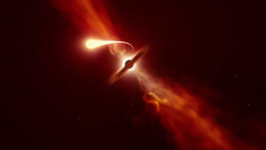 Umělecká představa černé díry požírající hvězdu. 