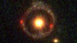 Extrémně vzdálený Einsteinův prstenec na snímku Webbova dalekohledu. 