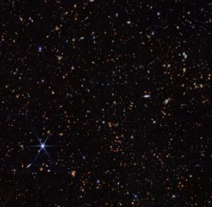 Snímek získaný v rámci výzkumu projektem JADES. Tento kus oblohy se nachází v souhvězdí Pece. 